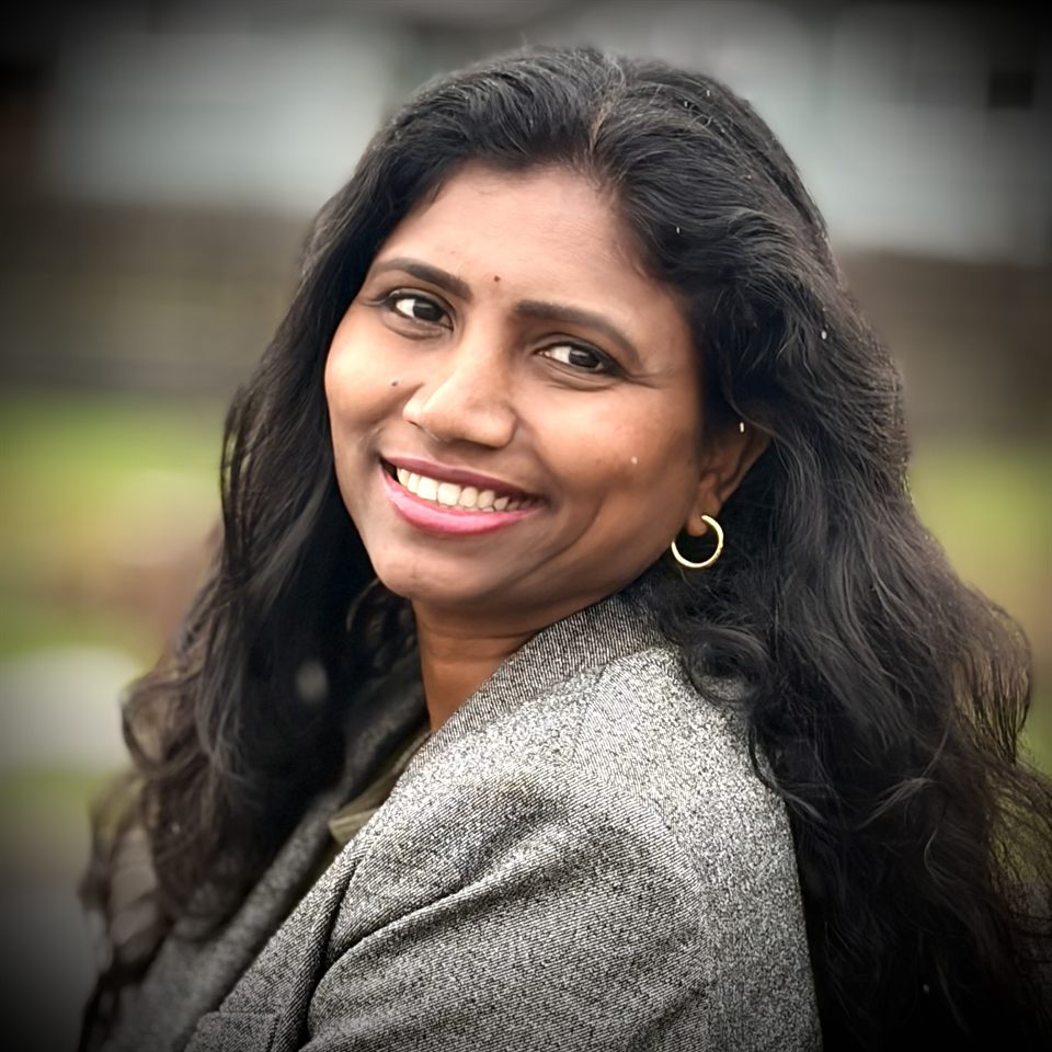 Portrait of Shuganya Sekhar, smiling, outdoors